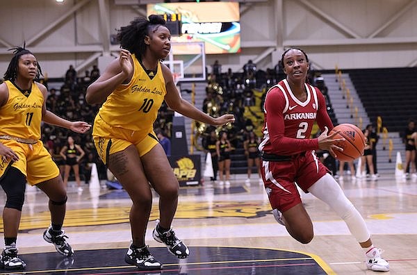 Arkansas guard Samara Spencer (2) dribbles the ball during a game against UAPB at the H.O. Clemmons Arena in Pine Bluff on Monday, Nov. 7, 2022.