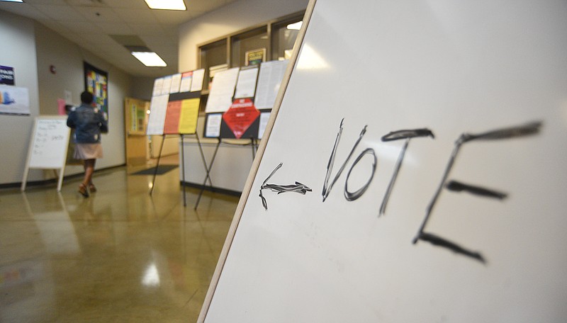 Staff photo by Matt Hamilton /  A hand-written sign directs voters to their polling place at the Mack Gaston Community Center in Dalton, Ga. on Tuesday, November 8, 2022.