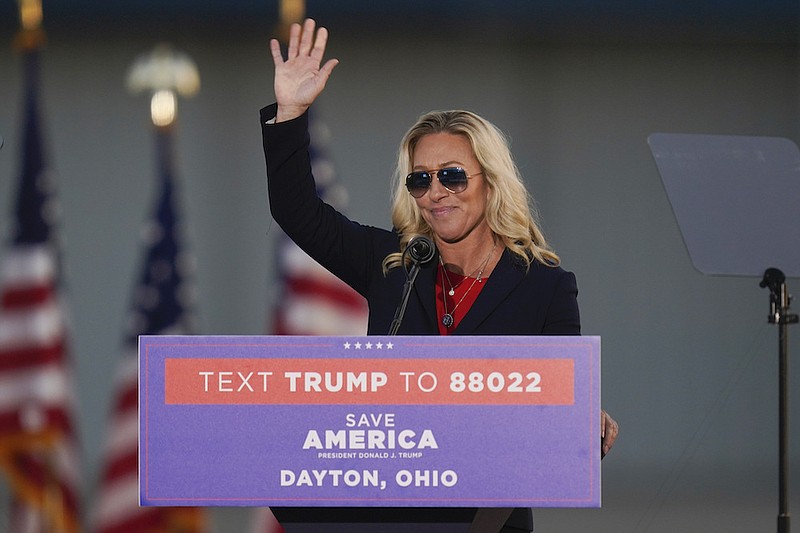 Rep. Marjorie Taylor Greene, R-Ga., speaks before former President Donald Trump speaks at a rally in support of the campaign of Ohio Senate candidate JD Vance at Wright Bros. Aero Inc. at Dayton International Airport on Monday, Nov. 7, 2022, in Vandalia, Ohio. (AP Photo/Michael Conroy)