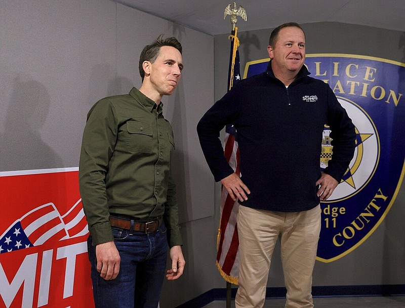 Sen. Josh Hawley, left, R-Missouri, campaigns for U.S. Senate candidate Eric Schmitt, right, at the St Louis County Police Association Missouri Fraternal Order of Police Lodge 111 in Manchester, Mo., on Monday, Nov. 7, 2022. (David Carson/St. Louis Post-Dispatch via the Associated Press)