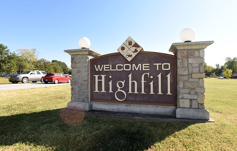 Traffic passes the Highfill welcome sign along Arkansas 12 near the Highfill City Park in this Oct. 15, 2022 file photo. (NWA Democrat-Gazette/Flip Putthoff)