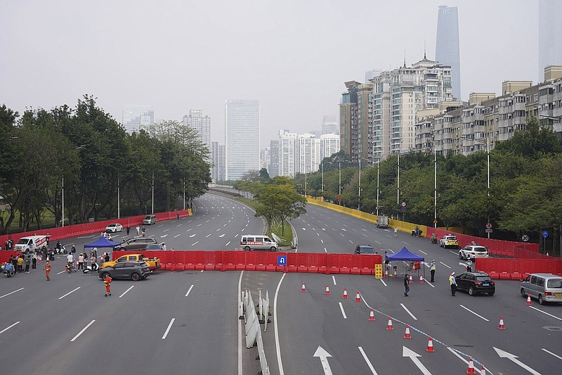 Barriers form a security checkpoint in the Haizhu district Friday in Guangzhou in southern China’s Guangdong province.
(AP)