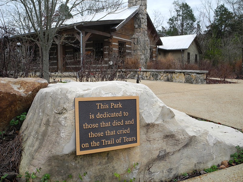 Staff Photo / The dedication plaque, shown on Dec. 25, 2011, at the Cherokee Removal Memorial Park stands as a reminder to the Trail of Tears, a common name for the Cherokee removal prompted by the 1835 census of Cherokees east of the Mississippi.