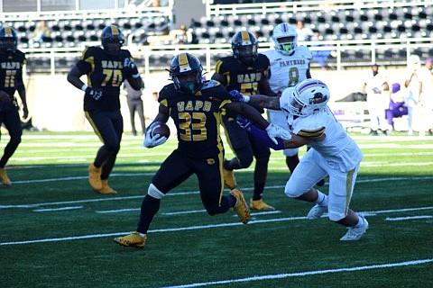 Kayvon Britten of UAPB breaks a tackle from Prairie View A&M in the first half Saturday at Simmons Bank Field. 
(Special to The Commercial/Jamie Hooks)