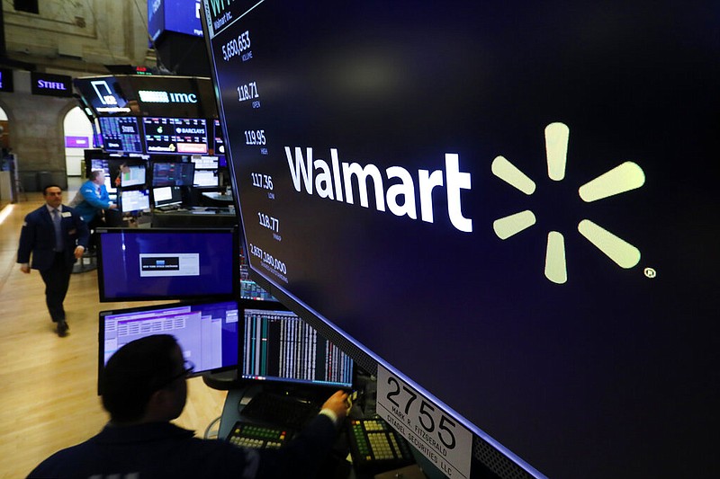 FILE - In this Feb. 18, 2020 file photo, the logo for Walmart appears above a trading post on the floor of the New York. (AP/Richard Drew, File)