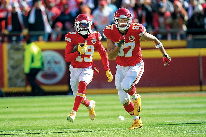 Chiefs tight end Travis Kelce leads Chiefs wide receiver Kadarius Toney down the field during Sunday afternoon’s game against the Jaguars at Arrowhead Stadium in Kansas City. (Associated Press)