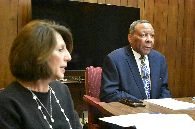 Civic Auditorium Complex Commission Executive Director Joseph McCorvey listens to commission Chair Lisa Kosmitis take a vote on accepting Marriott Hotels' offer to construct a Courtyard by Marriott hotel near the Convention Center on Wednesday. (Pine Bluff Commercial/I.C. Murrell)