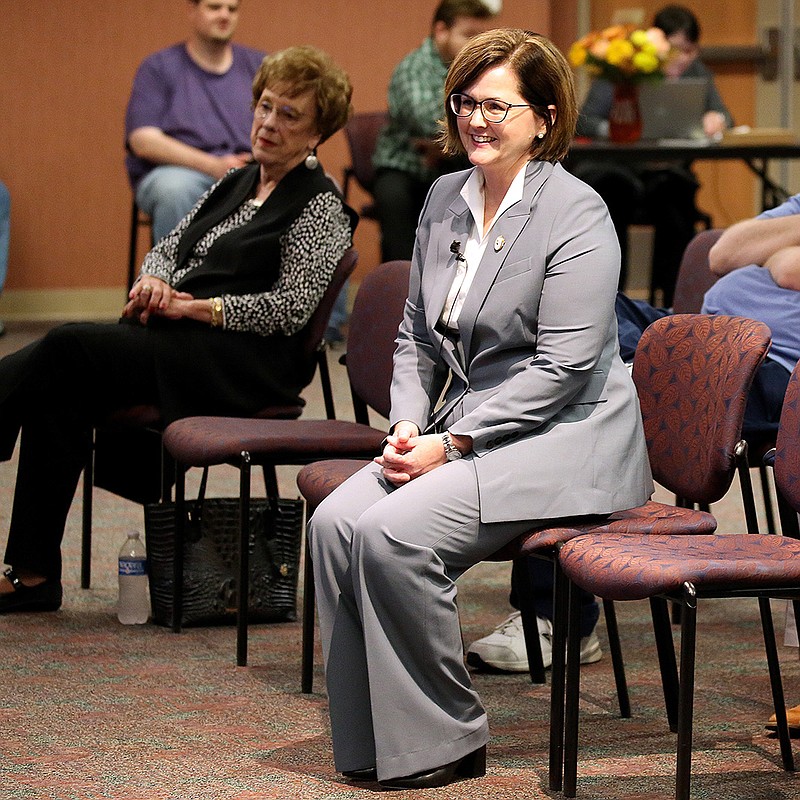 Summer DeProw (center) listens as she is introduced before giving a presentation at the University of Arkansas-Pulaski Technical College on Oct. 24 as a finalist to become chancellor of the college. The UA System Board of Trustees selected DeProw for the post on Wednesday.
(Arkansas Democrat-Gazette/Thomas Metthe)