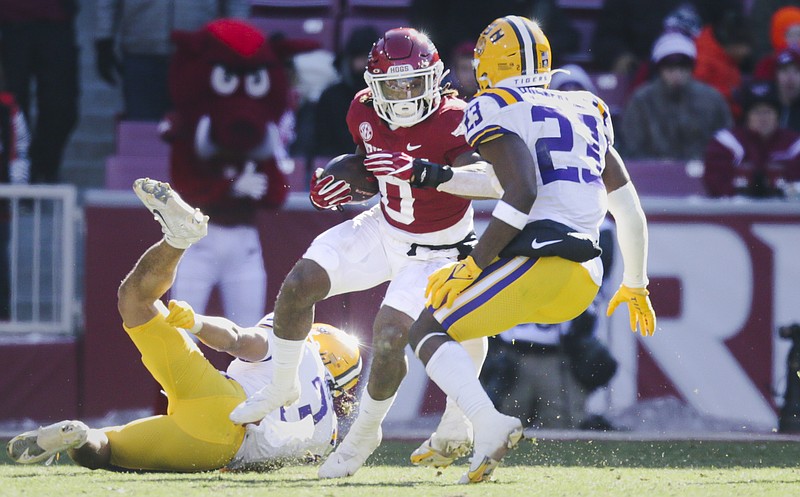 Arkansas running back AJ Green (0) carries the ball, Saturday, November 12, 2022 during the third quarter of a football game at Donald W. Reynolds Razorback Stadium in Fayetteville. Visit nwaonline.com/221113Daily/ for today's photo gallery...(NWA Democrat-Gazette/Charlie Kaijo)