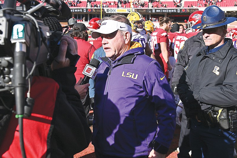 LSU coach Brian Kelly talks to reporters after last Saturday's 13-10 win against Arkansas in Fayetteville, Ark. (Associated Press)