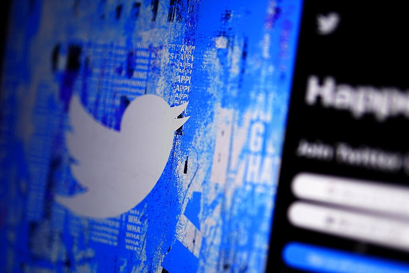 FILE - The Twitter splash page is seen on a digital device, Monday, April 25, 2022, in San Diego. (AP/Gregory Bull, File)