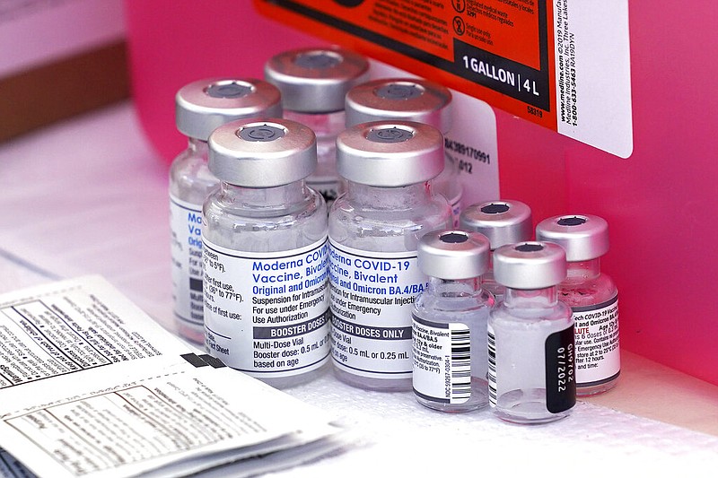 Vaccines for covid-19 and flu are seen at the L.A. Care and Blue Shield of California Promise Health Plans' Community Resource Center in Lynwood, Calif., in this Oct. 28, 2022 file photo. (AP/Mark J. Terrill)