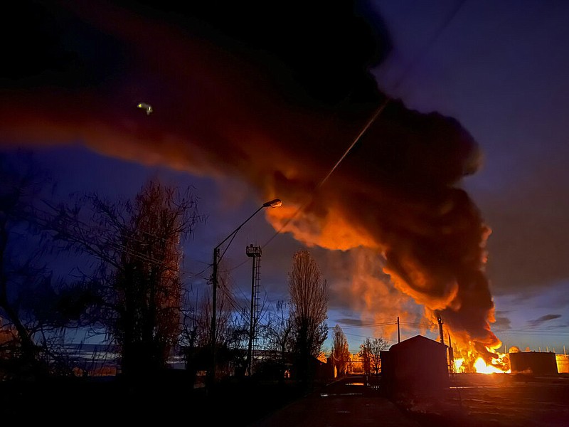 A plume of smoke rises during a fire caused by a Russian attack in Kherson, southern Ukraine, Saturday, Nov. 19, 2022. (AP/Roman Hrytsyna)