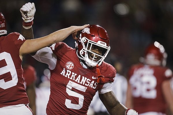 Arkansas running back Raheim Sanders (5) celebrates a touchdown during a game against Ole Miss on Saturday, Nov. 19, 2022, in Fayetteville.