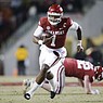 Arkansas quarterback KJ Jefferson (1) carries the ball during a game against Ole Miss on Saturday, Nov. 19, 2022, in Fayetteville.