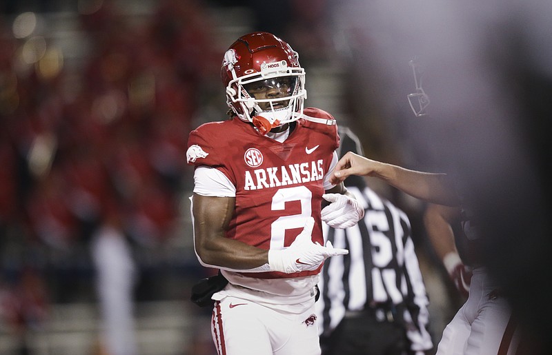 Arkansas wide receiver Ketron Jackson Jr. (2) scores, Saturday, November 19, 2022 during the second quarter of a football game at Donald W. Reynolds Razorback Stadium in Fayetteville. Visit nwaonline.com/221119Daily/ for today's photo gallery...(NWA Democrat-Gazette/Charlie Kaijo)