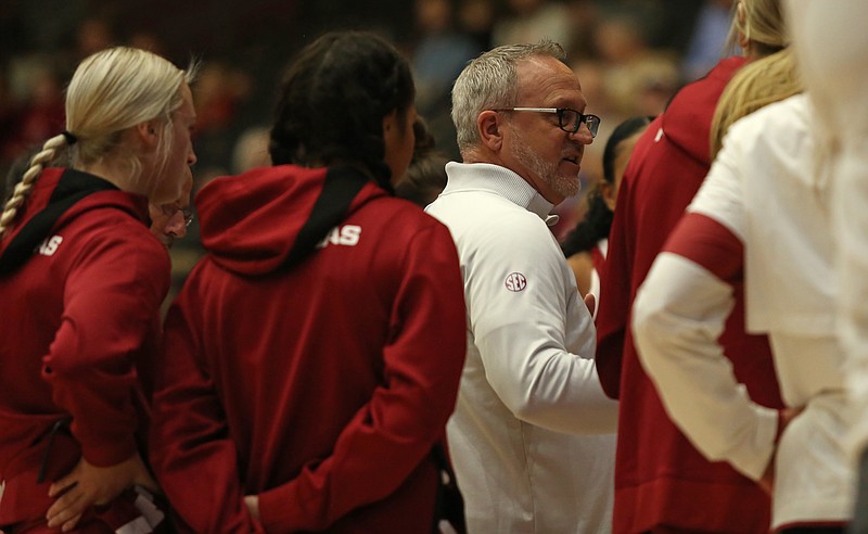 Razorbacks head coach Mike Neighbors talks to his team during a game on the road against UALR at the Jack Stephens Center on Sunday, Nov. 20, 2022. See more photos at arkansasonline.com/1121bball/ (Arkansas Democrat-Gazette/Colin Murphey)