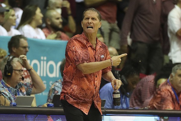 Arkansas head coach Eric Musselman reacts to play against Louisville during the first half of an NCAA college basketball game, Monday, Nov. 21, 2022, in Lahaina, Hawaii. (AP Photo/Marco Garcia)