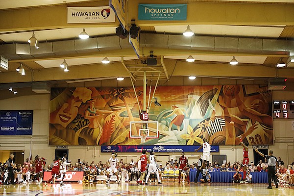 The Lahaina Civic Center is viewed during the first half of an NCAA college basketball game between Louisville and Arkansas, Monday, Nov. 21, 2022, in Lahaina, Hawaii. (AP Photo/Marco Garcia)