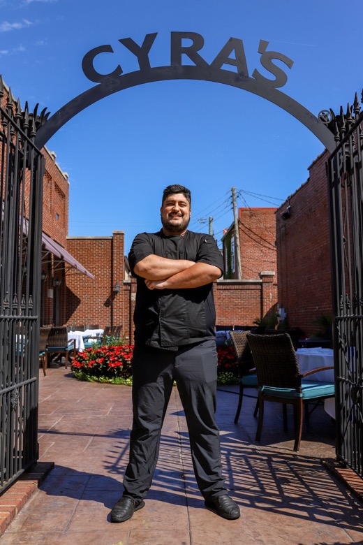 Staff photo by Olivia Ross  / Chef Jonathan Valadez of Cyra's in Dalton, Georgia, poses outside of the restaurant on Wednesday, Sept. 21, 2022.