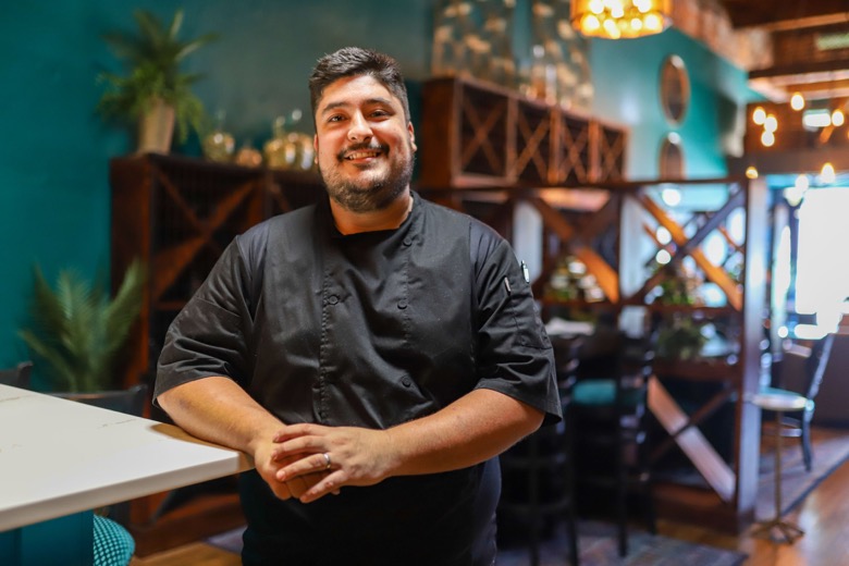 Staff photo by Olivia Ross / Chef Jonathan Valadez of Cyra's in Dalton, Georgia, poses in the restaurant on Wednesday, Sept. 21, 2022.