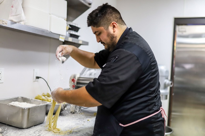 Staff photo by Olivia Ross  / Chef Jonathan Valadez of Cyra's in Dalton, Georgia, prepares pasta on Wednesday, Sept. 21, 2022.