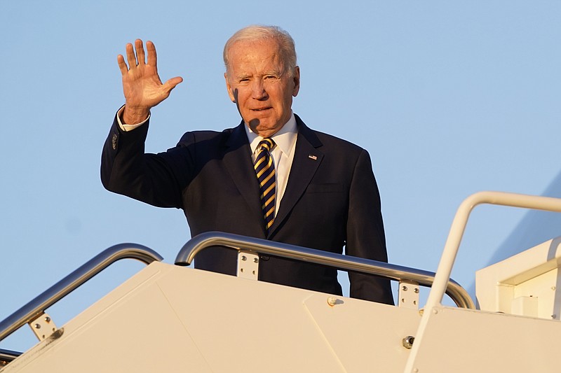 President Joe Biden waves as he boards Air Force One, Monday, Nov. 21, 2022, at Andrews Air Force Base, Md. (AP Photo/Patrick Semansky)