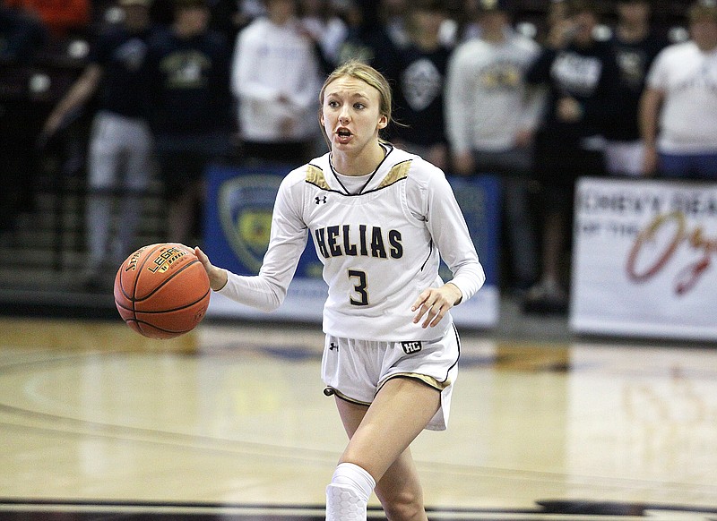 Mikah Edwards of Helias dribbles the ball up the court during the Class 4 girls third-place game against St. James last season at JQH Arena in Springfield. (Greg Jackson/News Tribune)