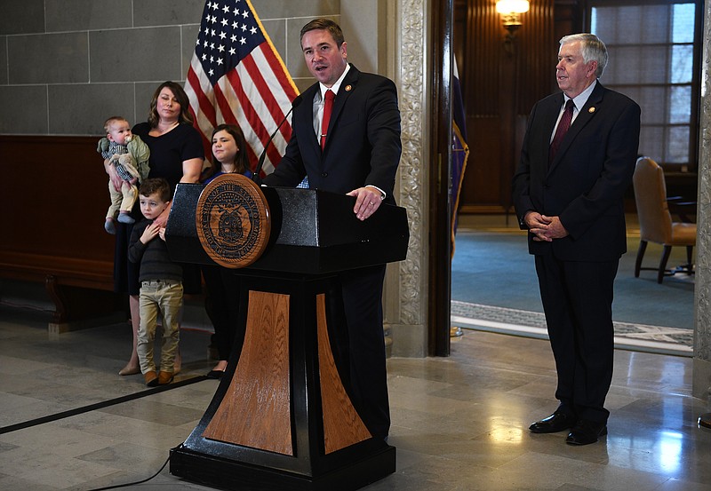 Eileen Wisniowicz/News Tribune photo: 
Andrew Bailey speaks Wednesday, Nov. 23, 2022, after Gov. Mike Parson announced him as the newly appointed attorney general for Missouri. Bailey's family stood by his side as he took the podium.