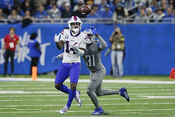 Detroit Lions wide receiver Amon-Ra St. Brown reacts after his 1-yard  reception for a touchdown during the first half of an NFL football game  against the Buffalo Bills, Thursday, Nov. 24, 2022