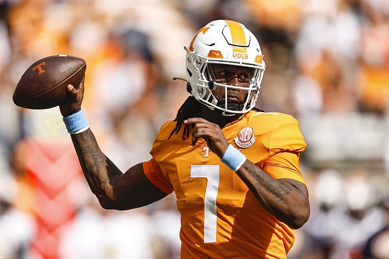 Tennessee quarterback Joe Milton III (7) throws to a receiver during the second half of an NCAA college football game against Tennessee Martin, Saturday, Oct. 22, 2022, in Knoxville, Tenn. Tennessee won 65-24. (AP Photo/Wade Payne)