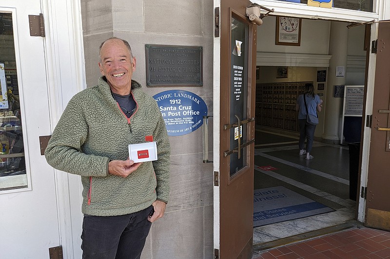 Marc Randolph, the first chief executive officer of Netflix, stands outside the Santa Cruz, Calif., post office where in 1997 he mailed a Patsy Cline CD to determine whether a disc could make it through the postal system without being damaged.
(AP/Michael Liedtke)