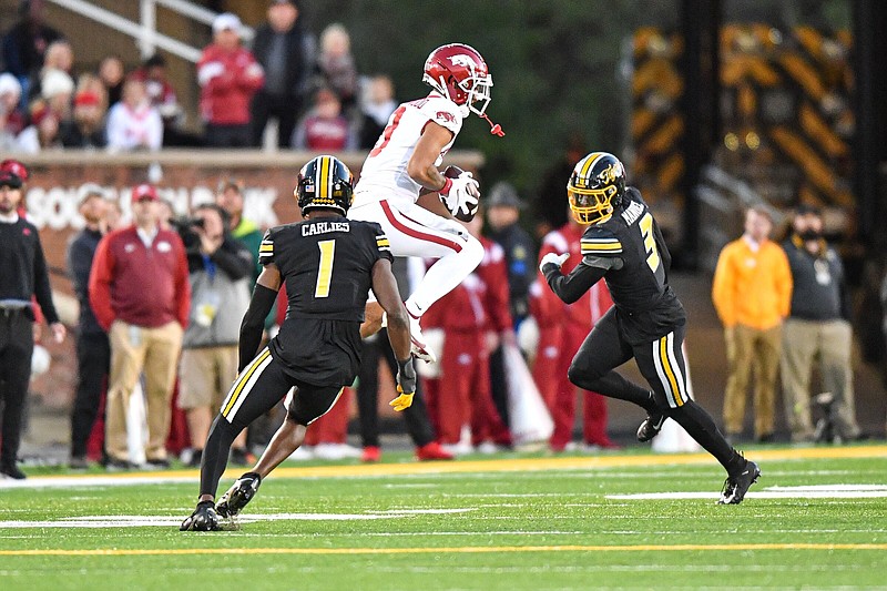 Arkansas wide receiver Jadon Haselwood catches a pass during the third quarter Friday against Missouri in Columbia, Mo. Haselwood had a team-high seven receptions for 74 yards for the Razorbacks. More photos at arkansasonline.com/1126uamizzou/
(NWA Democrat-Gazette/Hank Layton)
