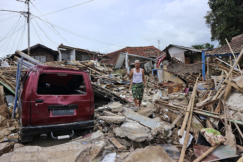A man walks Friday in the rubble of a neighborhood heavily affected by Monday’s earthquake, in Cianjur, West Java, Indonesia.
(AP/Rangga Firmansyah)