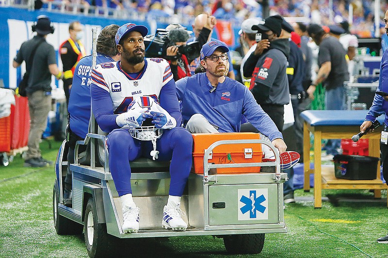 Bills linebacker Von Miller is carted off the field during the first half of Thursday's game against the Lions in Detroit. (Associated Press)