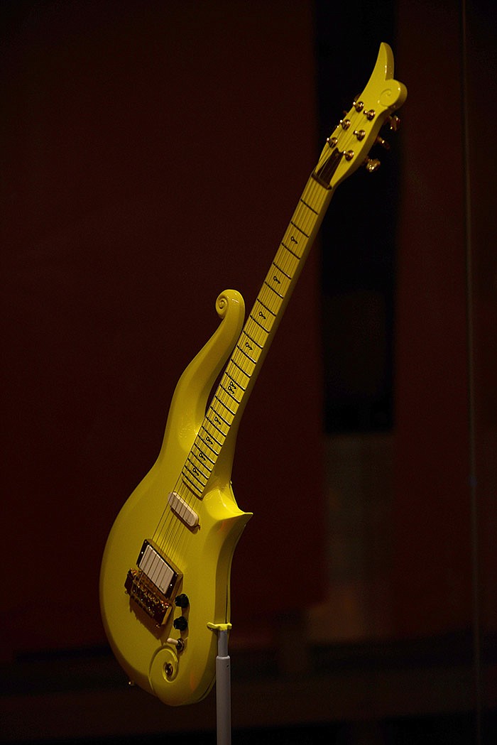Prince’s iconic “Yellow Cloud” guitar, which was painted white for the film “Purple Rain,” was donated by the artist in 1993.
(For The Washington Post/Astrid Riecken)