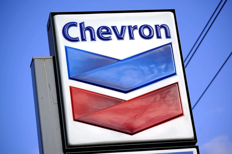 FILE - A Chevron sign is displayed outside one of the company's gas stations in Bradenton, Fla., Feb. 22, 2022. (AP Photo/Gene J. Puskar, File)