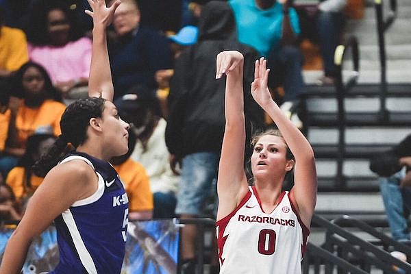 Arkansas' Saylor Poffenbarger (0) shoots during a game against Kansas State on Saturday, Nov. 26, 2022, at the UVI Sports and Fitness Center in Charlotte Amalie, U.S. Virgin Islands.