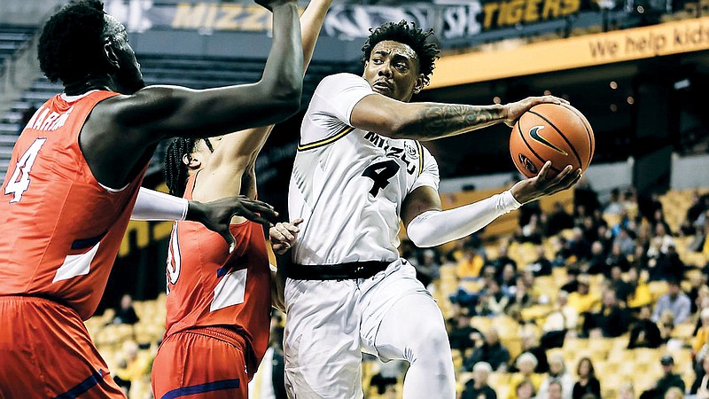DeAndre Gholston of Missouri looks for a teammate to pass to during Saturday’s game against Houston Christian at Mizzou Arena in Columbia. (Courtesy of Mizzou Athletics)