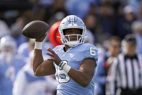 North Carolina quarterback Jacolby Criswell (6) passes against Wofford during the first half of an NCAA college football game in Chapel Hill, N.C., Saturday, Nov. 20, 2021. (AP Photo/Gerry Broome)