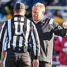 Arkansas coach Sam Pittman (right) speaks to an official during a game against Missouri on Friday, Nov. 25, 2022, in Columbia, Mo.