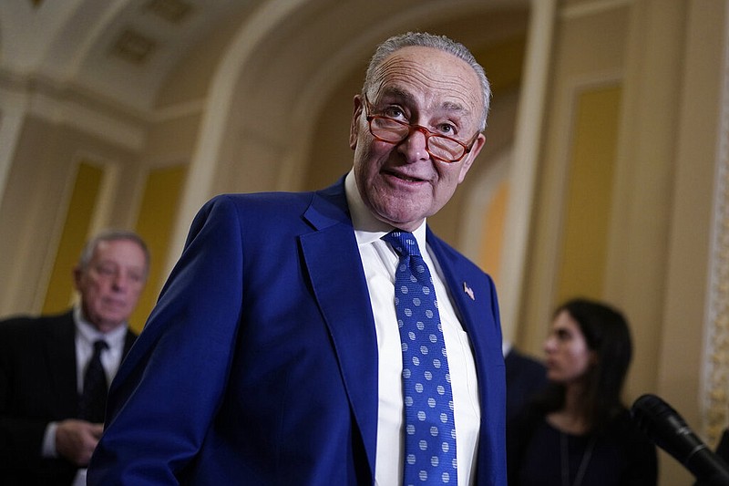 FILE - Senate Majority Leader Chuck Schumer, D-N.Y., speaks to reporters at the Capitol in Washington, Nov. 15, 2022. Democrats celebrating a successful effort to keep control of the U.S. Senate this year will soon confront a 2024 campaign that could prove more challenging. (AP Photo/J. Scott Applewhite, File)