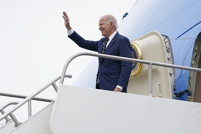 President Joe Biden steps off Air Force One at MBS International Airport in Freeland, Mich., Tuesday, Nov. 29, 2022. Biden is in Michigan to tour a computer chip factory and speak about manufacturing jobs and the economy. (AP Photo/Patrick Semansky)