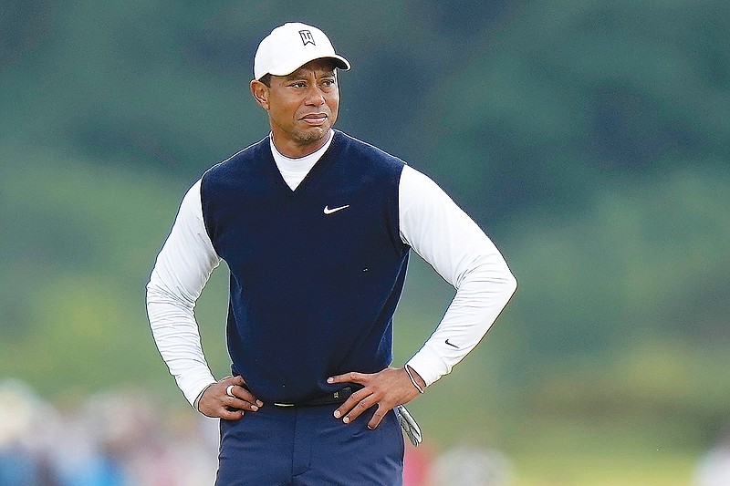 In this July 14 file photo, Tiger Woods stands on the 11th hole during the first round of the British Open on the Old Course at St. Andrews, Scotland. (Associated Press)