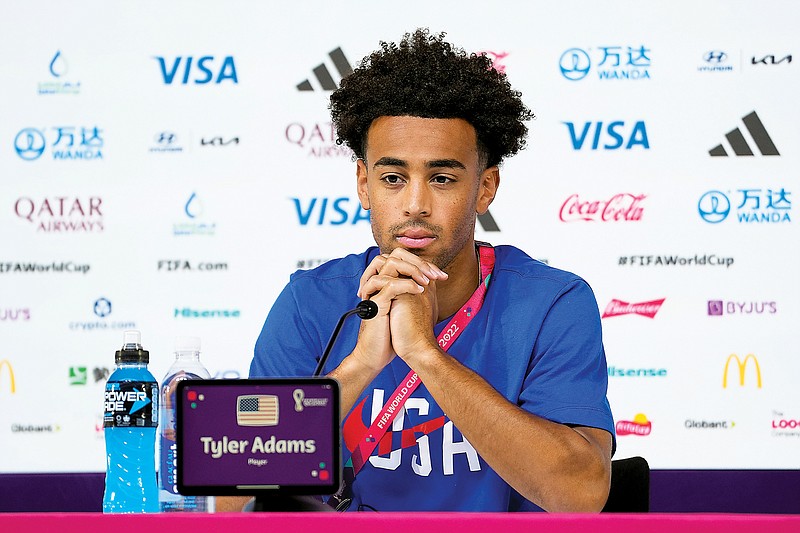 Tyler Adams of the United States listens to a question Monday during a press conference on the eve of a World Cup Group B match against Iran in Doha, Qatar. (Associated Press)