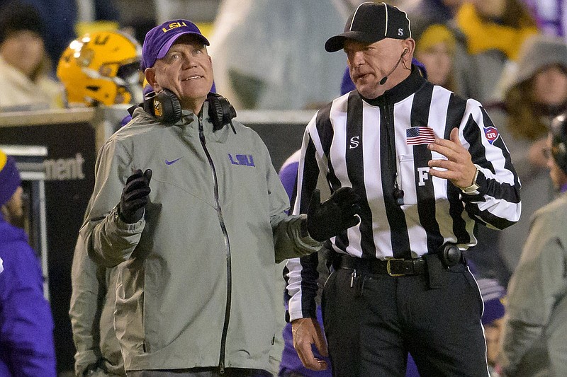 Brian Kelly (left) led LSU to the SEC West title in his first season as the Tigers’ coach. The No. 14 Tigers will face top-ranked Georgia in the SEC Championship Game on Saturday in Atlanta.
(AP/Matthew Hinton)