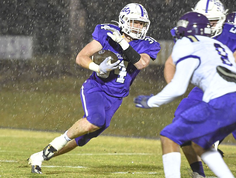 Booneville running back Dax Goff (34) carries the ball on a touchdown run, Friday, Nov. 11, 2022, during the first quarter of a Class 3A first-round playoff football game against Junction City at Bearcats Stadium in Booneville. (NWA Democrat-Gazette/Hank Layton)