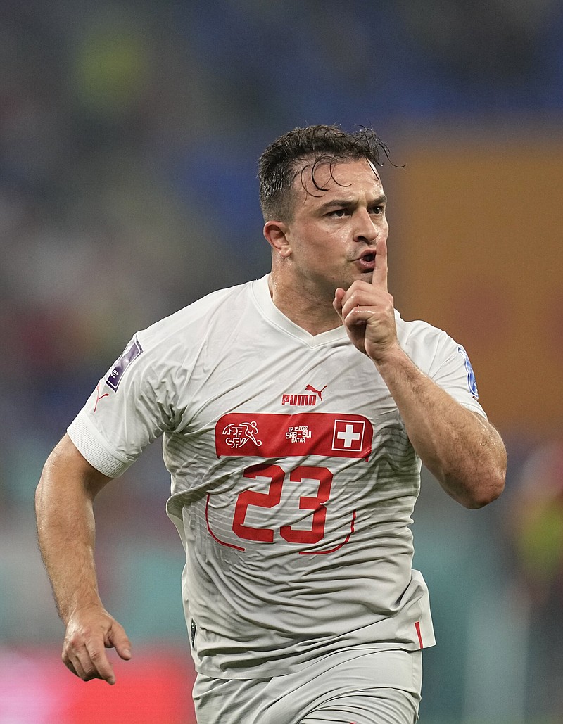 Switzerland’s Xherdan Shaqiri gestures toward the crowd at Stadium 974 in Doha, Qatar, after scoring a goal in the first half Friday against Serbia in the World Cup. More photos at arkansasonline.com/123wcup22/
(AP/Ebrahim Noroozi)