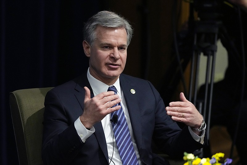 FBI Director Christopher Wray speaks at the Gerald R. Ford School of Public Policy at the University of Michigan, Friday, Dec. 2, 2022, in Ann Arbor, Mich. (AP Photo/Carlos Osorio)