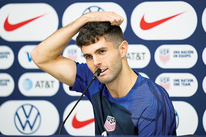Christian Pulisic of the United States listens to a question during Thursday’s press conference in Doha, Qatar. (Associated Press)